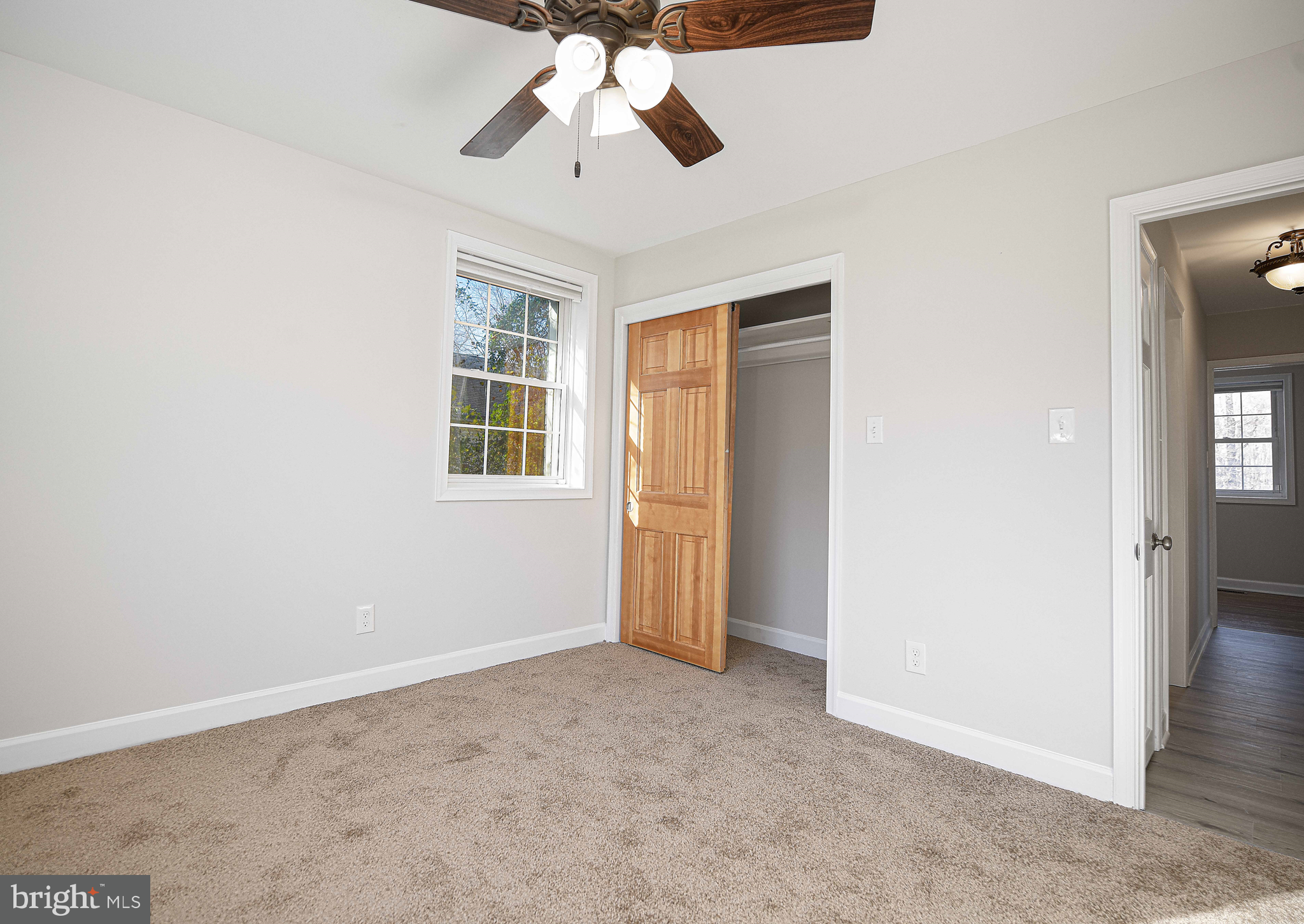 518 Wampler Road Middle River, MD 21220 - Photo 16 of 49 an empty room with chandelier fan