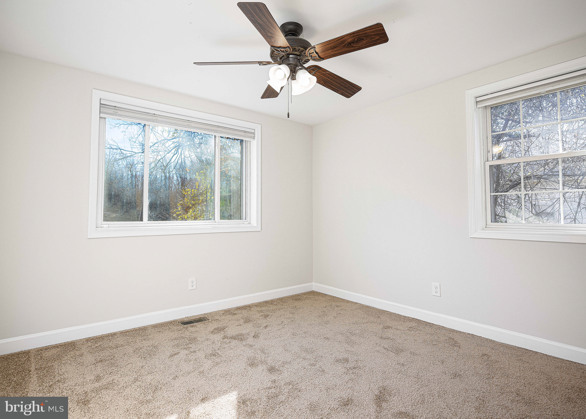 518 Wampler Road Middle River, MD 21220 - Photo 17 of 49 an empty room with a window and a fan