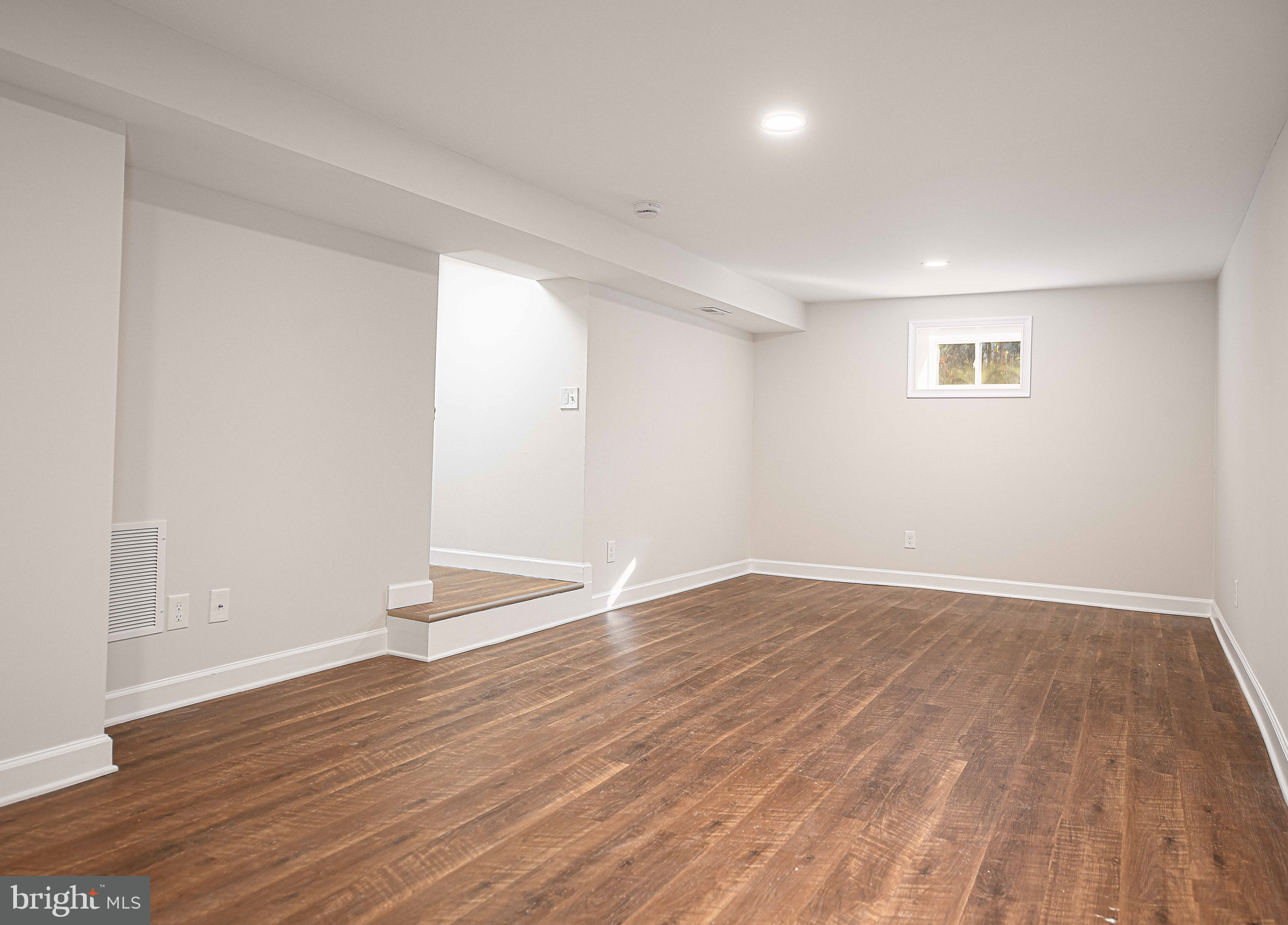 518 Wampler Road Middle River, MD 21220 - Photo 30 of 49 a view of an empty room with wooden floor