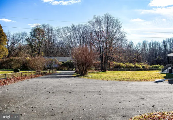 a view of a backyard of the house