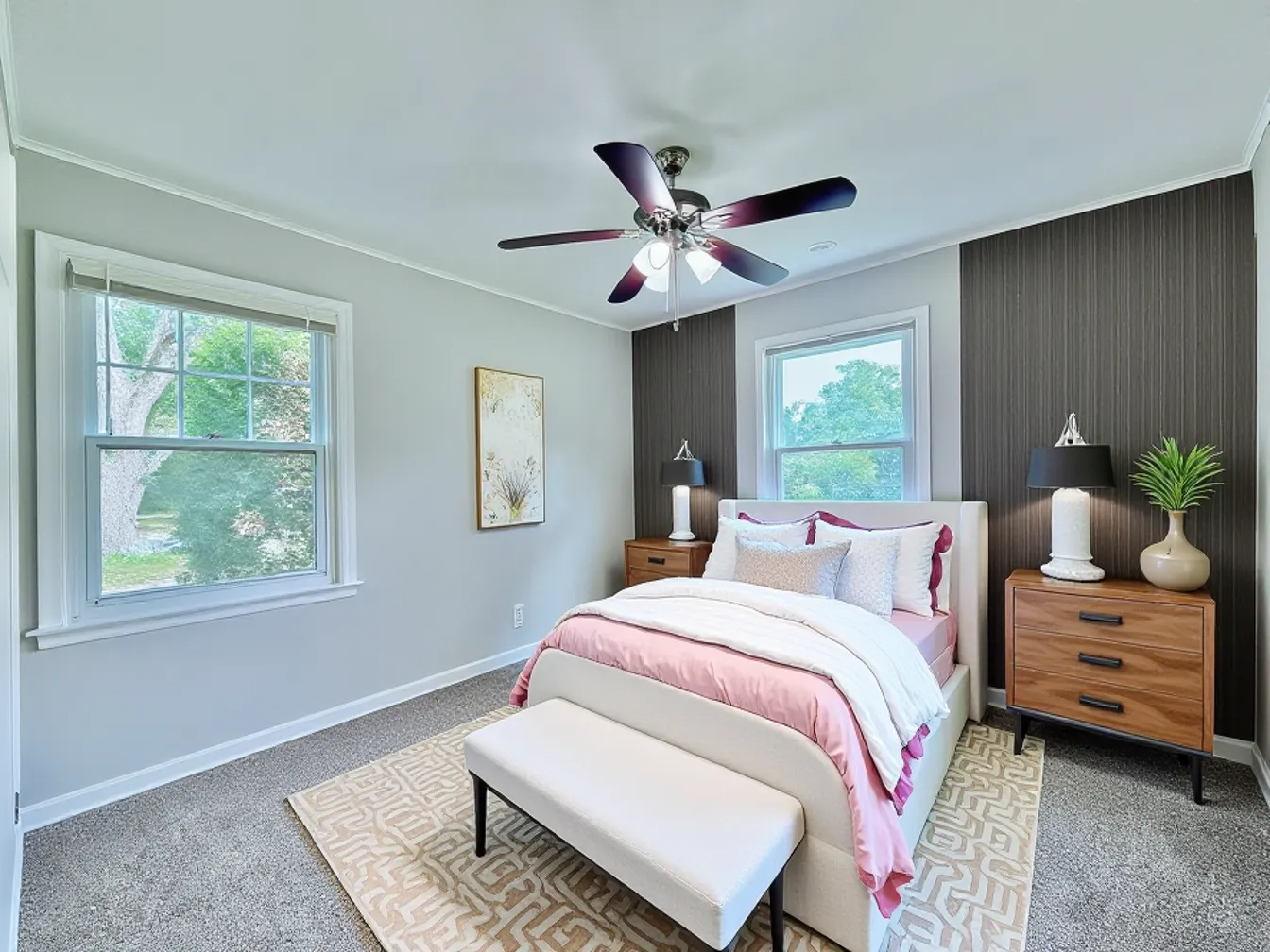 16784 Crane Avenue Hazel Crest, IL 60429 - Photo 11 of 24 a bedroom with a bed chandelier and a window