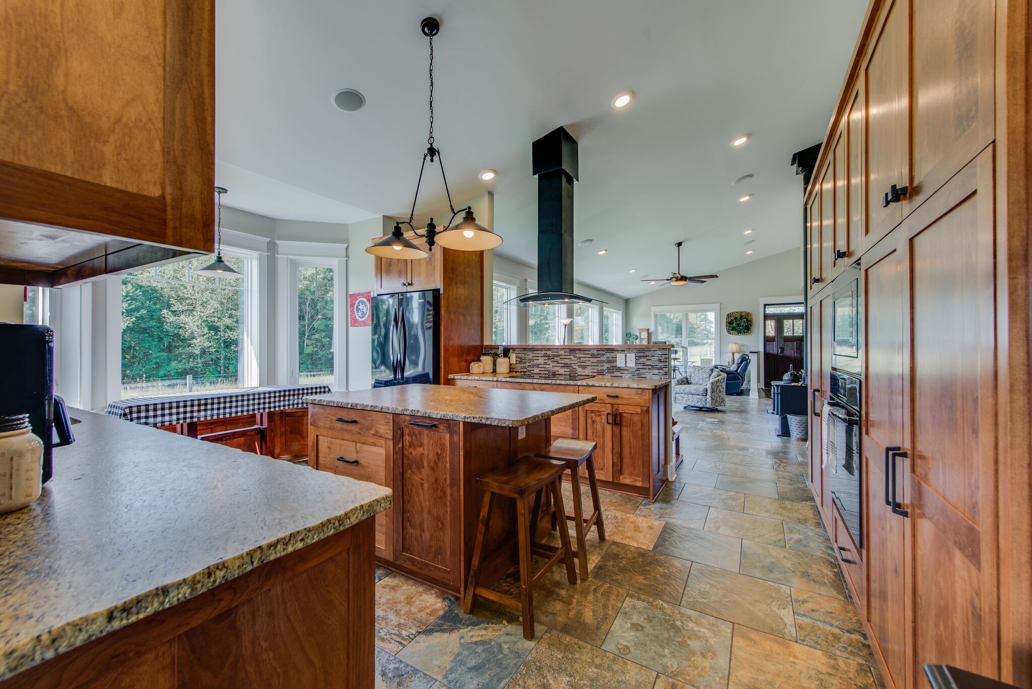 5062 Cathey Ridge Road Manchester, TN 37355 - Photo 12 of 47 a kitchen with stainless steel appliances granite countertop sink stove and refrigerator
