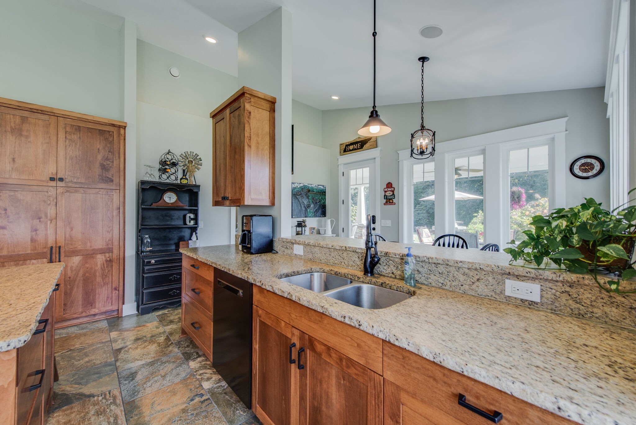 5062 Cathey Ridge Road Manchester, TN 37355 - Photo 14 of 47 a kitchen with stainless steel appliances granite countertop a sink a stove and a wooden cabinets