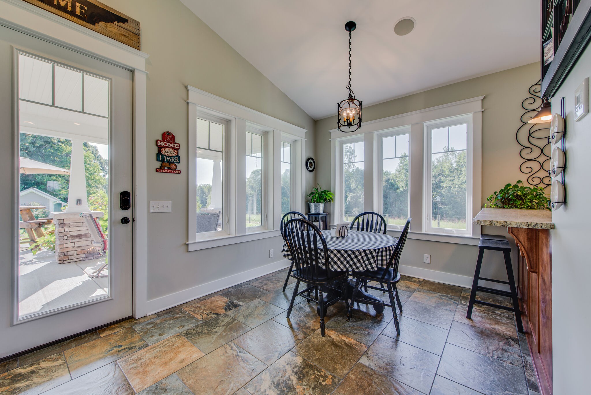 5062 Cathey Ridge Road Manchester, TN 37355 - Photo 16 of 47 a view of a dining room with furniture window and outside view