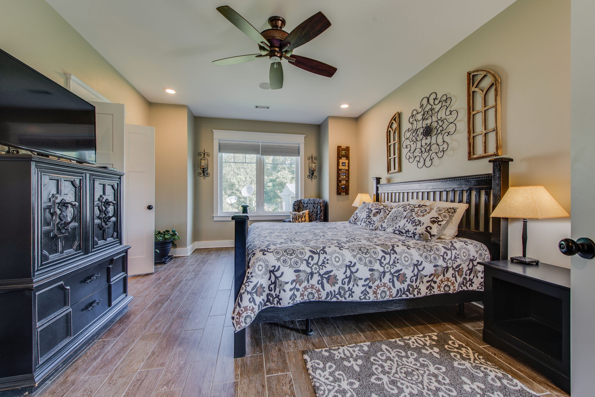 5062 Cathey Ridge Road Manchester, TN 37355 - Photo 20 of 47 a bedroom with a bed and a flat screen tv