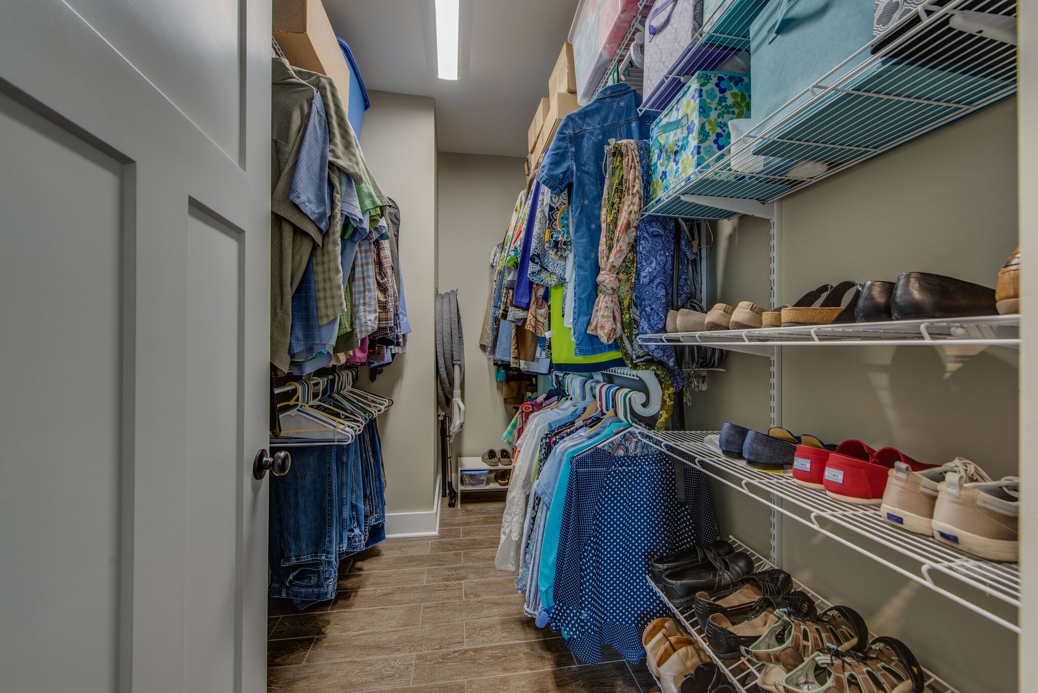 5062 Cathey Ridge Road Manchester, TN 37355 - Photo 21 of 47 a view of walk in closet with clothes and shoes
