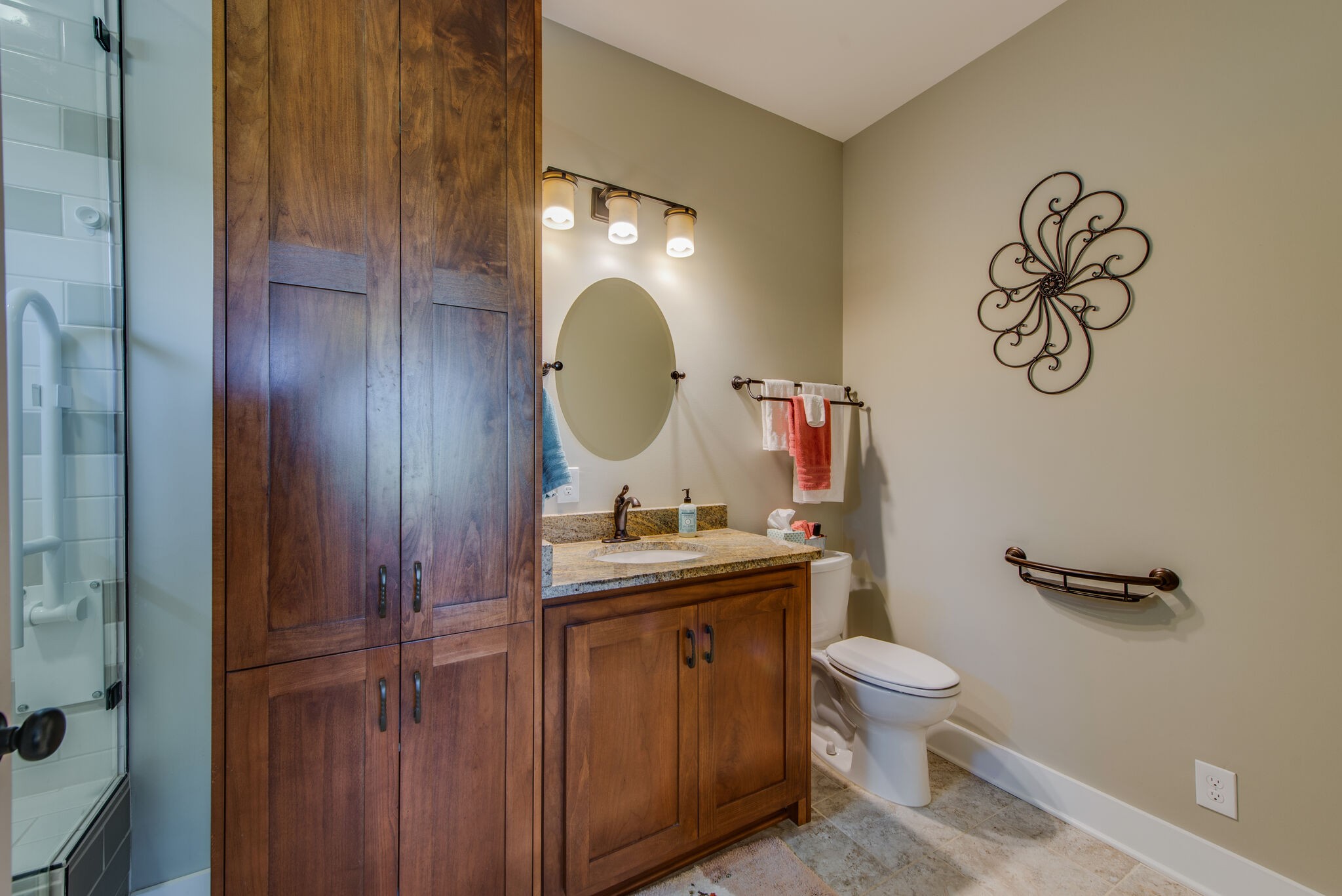 5062 Cathey Ridge Road Manchester, TN 37355 - Photo 26 of 47 a bathroom with a toilet a sink and mirror