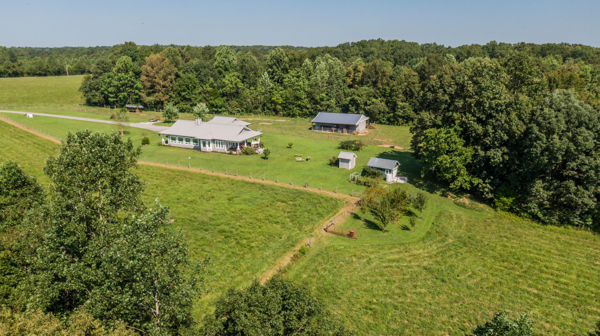 5062 Cathey Ridge Road Manchester, TN 37355 - Photo 45 of 47 a view of a lake with a houses