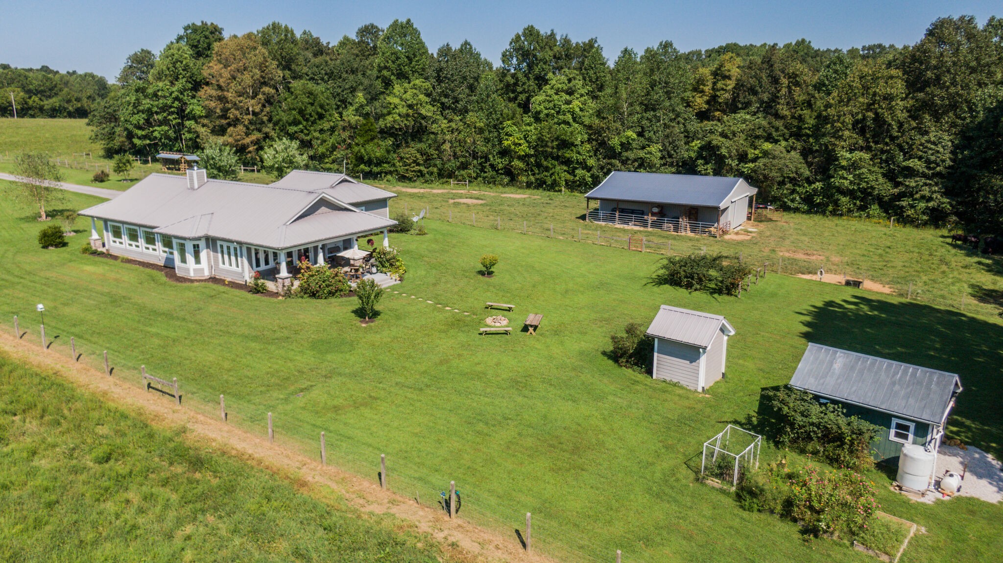 5062 Cathey Ridge Road Manchester, TN 37355 - Photo 46 of 47 an aerial view of a house with garden space and street view