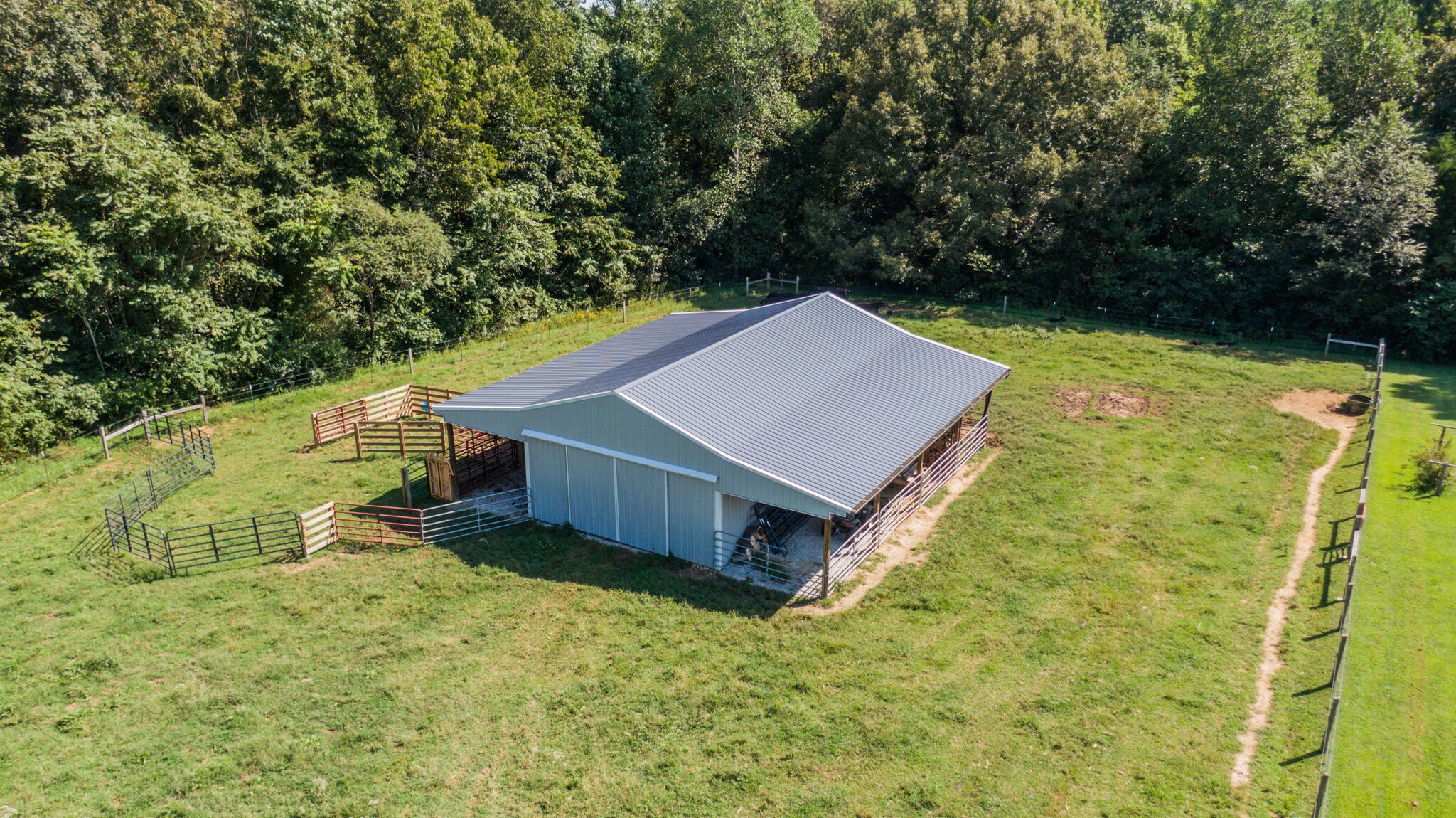 5062 Cathey Ridge Road Manchester, TN 37355 - Photo 47 of 47 a house with trees in front of it