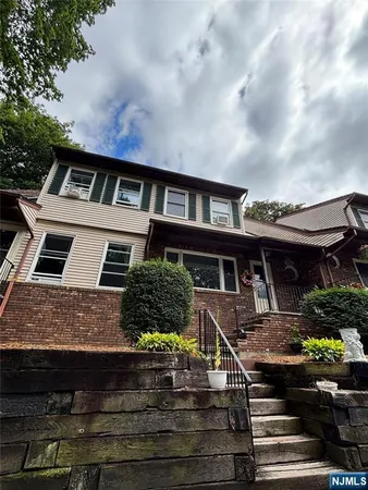 a front view of house with yard