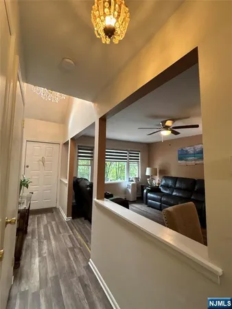 a view of a living room and dining room