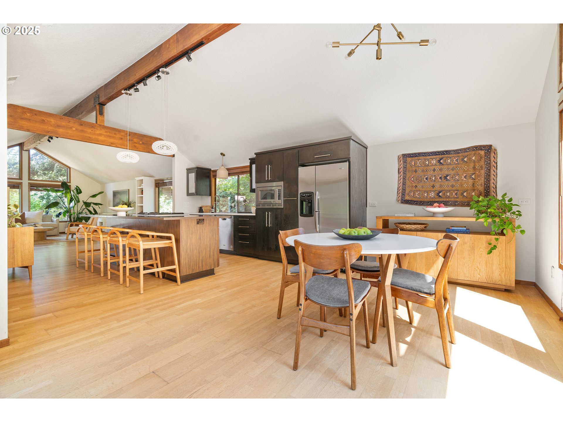 511 Southwest Colony Drive Portland, OR 97219 - Photo 14 of 46 a dining room with furniture and wooden floor