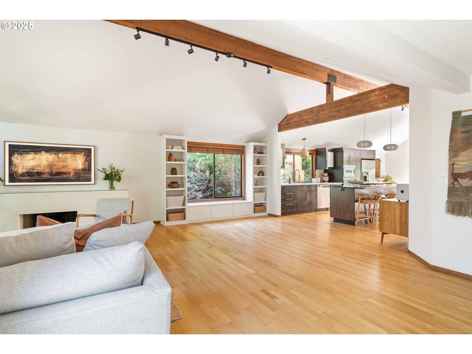 511 Southwest Colony Drive Portland, OR 97219 - Photo 16 of 46 a living room with furniture and a flat screen tv