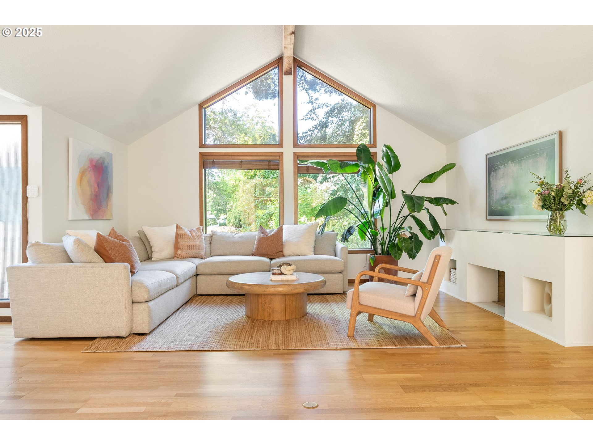 511 Southwest Colony Drive Portland, OR 97219 - Photo 2 of 46 a living room with furniture and a large window