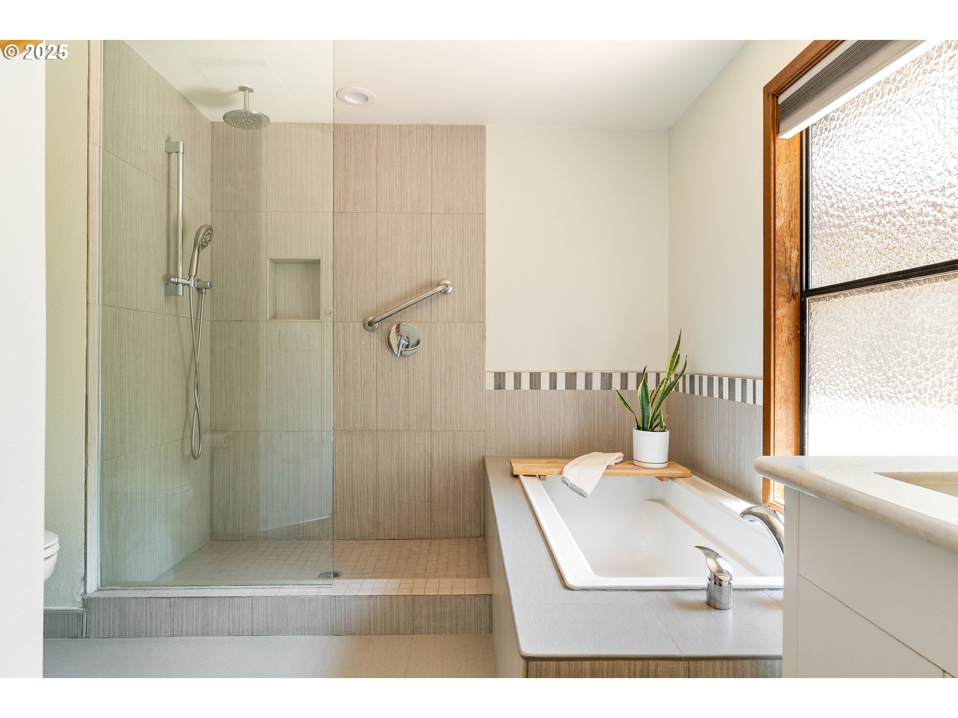 511 Southwest Colony Drive Portland, OR 97219 - Photo 21 of 46 a bathroom with a sink a toilet and shower