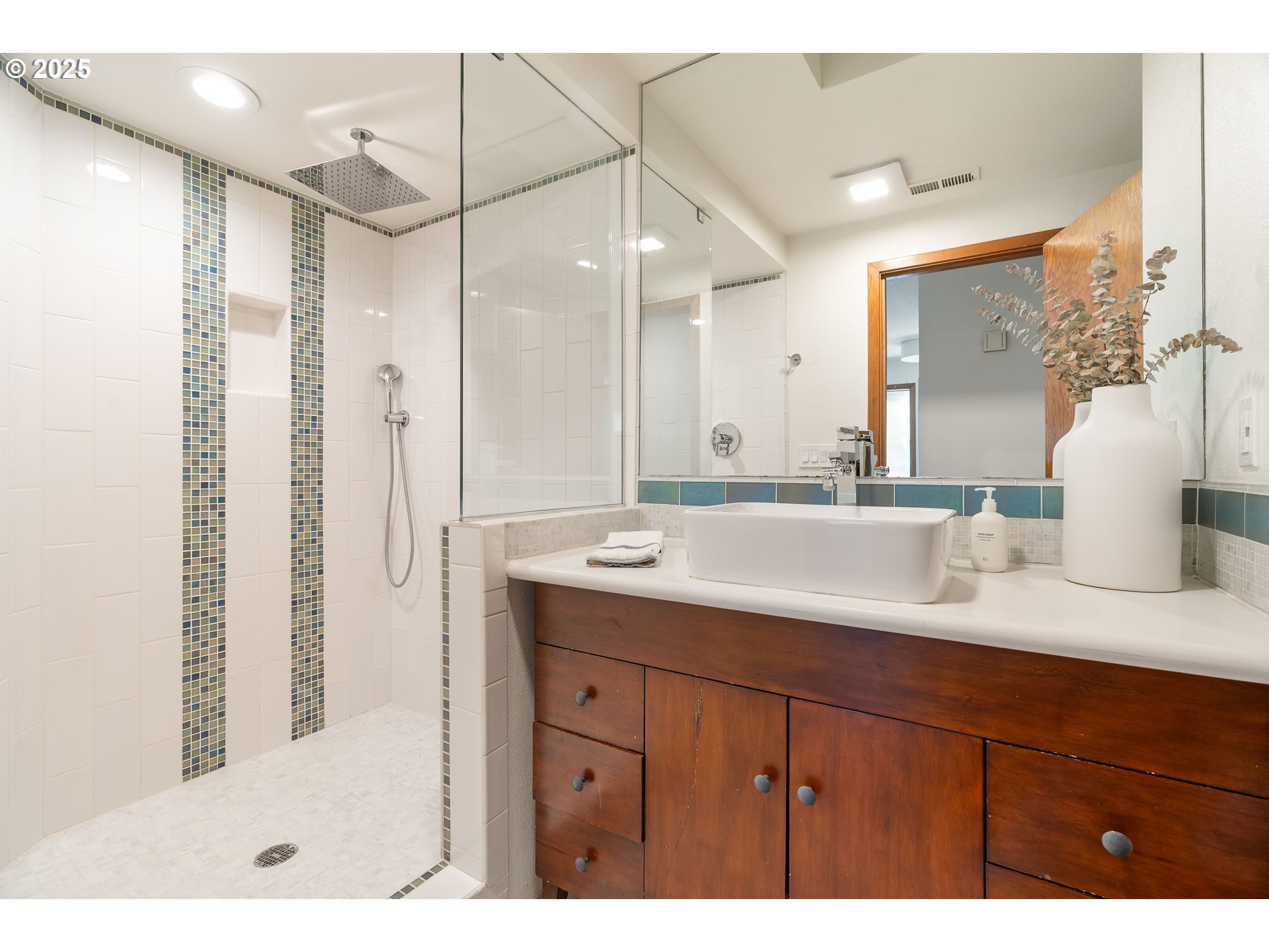 511 Southwest Colony Drive Portland, OR 97219 - Photo 29 of 46 a bathroom with a granite countertop sink mirror and double