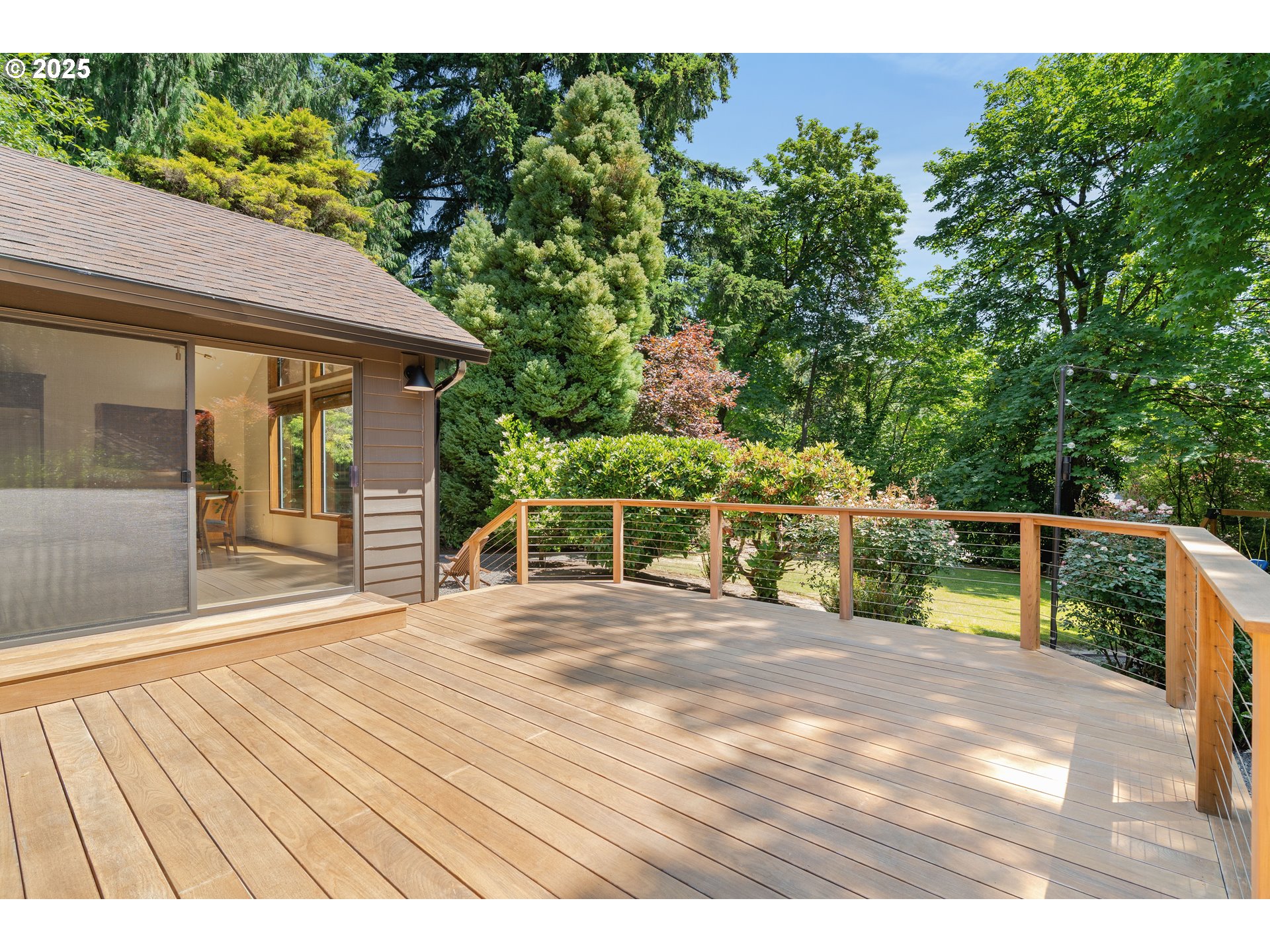 511 Southwest Colony Drive Portland, OR 97219 - Photo 30 of 46 a view of house with backyard and sitting area