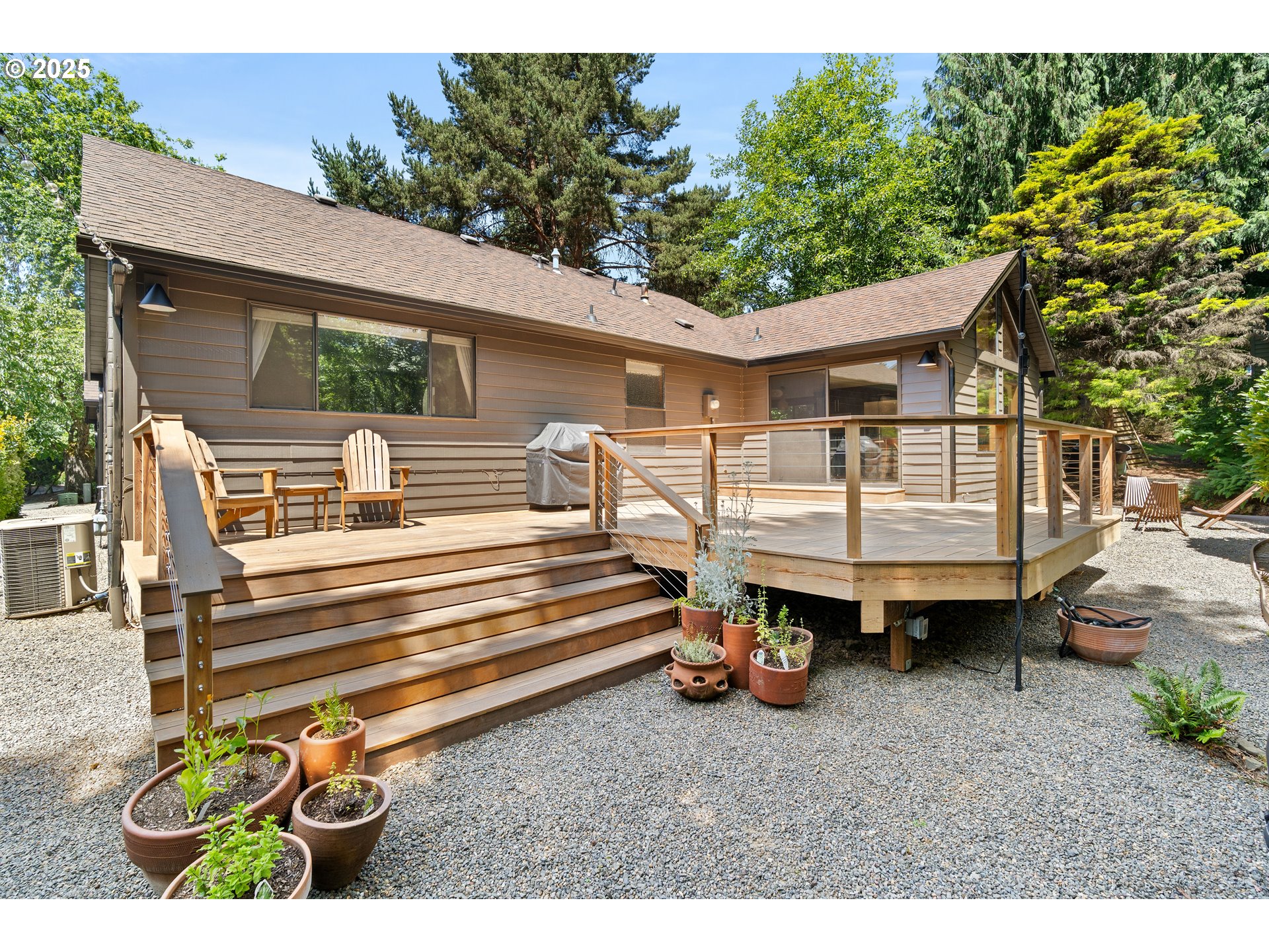 511 Southwest Colony Drive Portland, OR 97219 - Photo 32 of 46 a view of a back yard with a patio