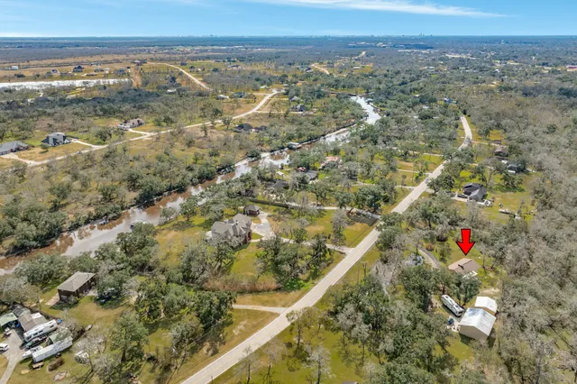 a view of city and green space