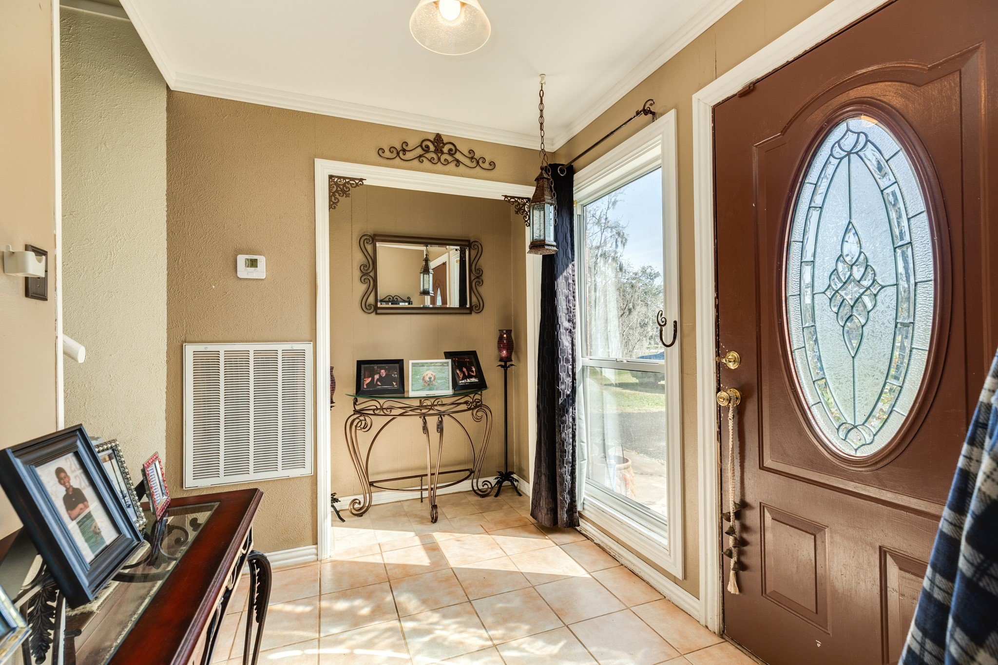 703 County Road 605 Angleton, TX 77515 - Photo 22 of 35 a view of a entryway with wooden floor and a rug