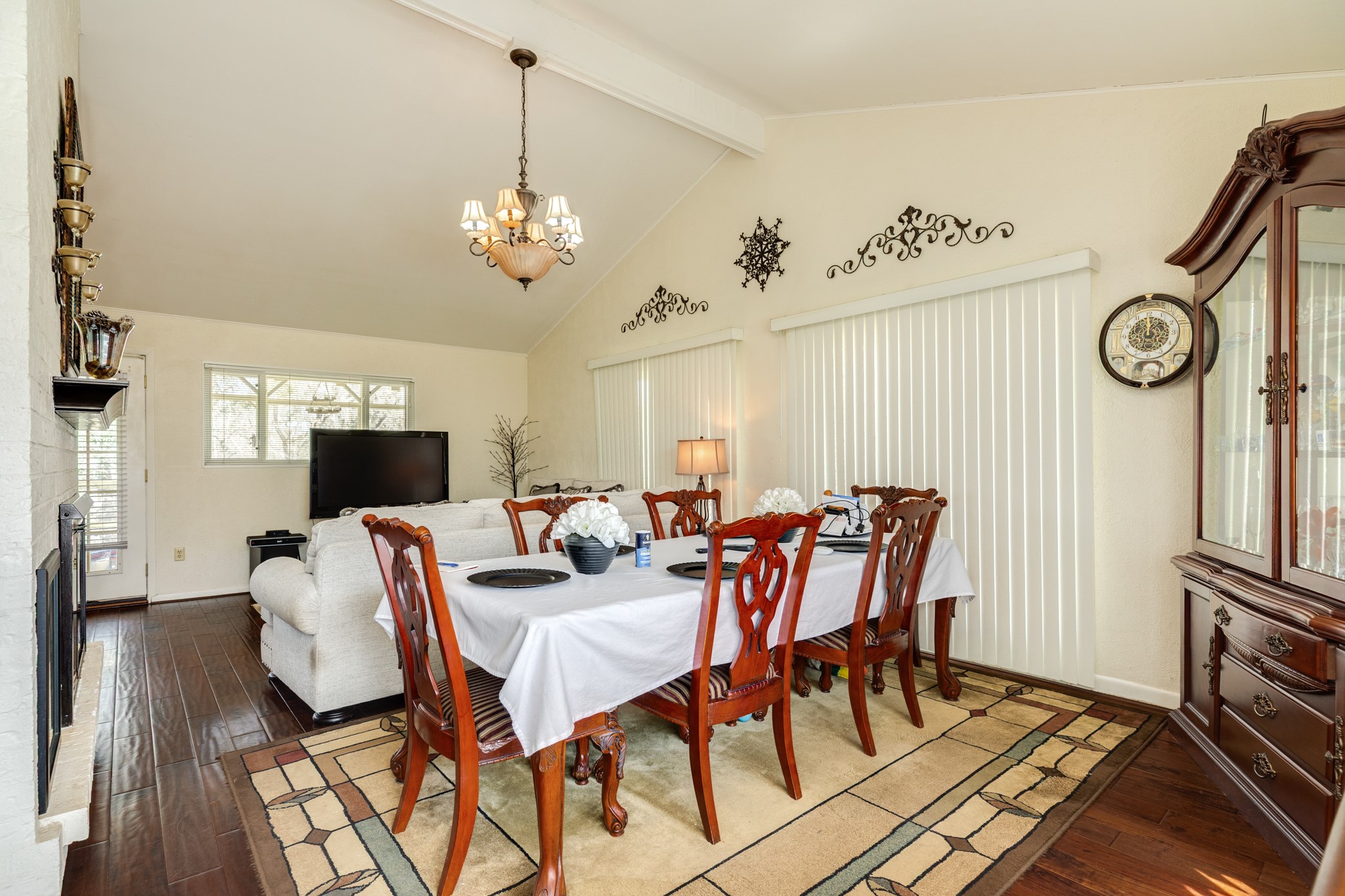 703 County Road 605 Angleton, TX 77515 - Photo 26 of 35 a view of a dining room with furniture and wooden floor