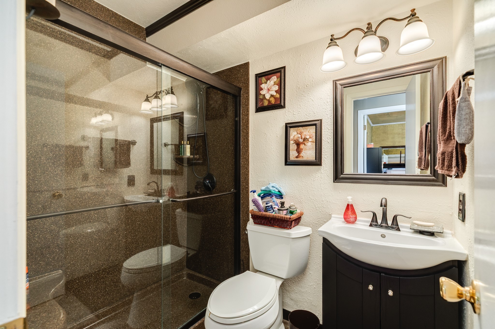 703 County Road 605 Angleton, TX 77515 - Photo 35 of 35 a bathroom with a toilet a sink and mirror