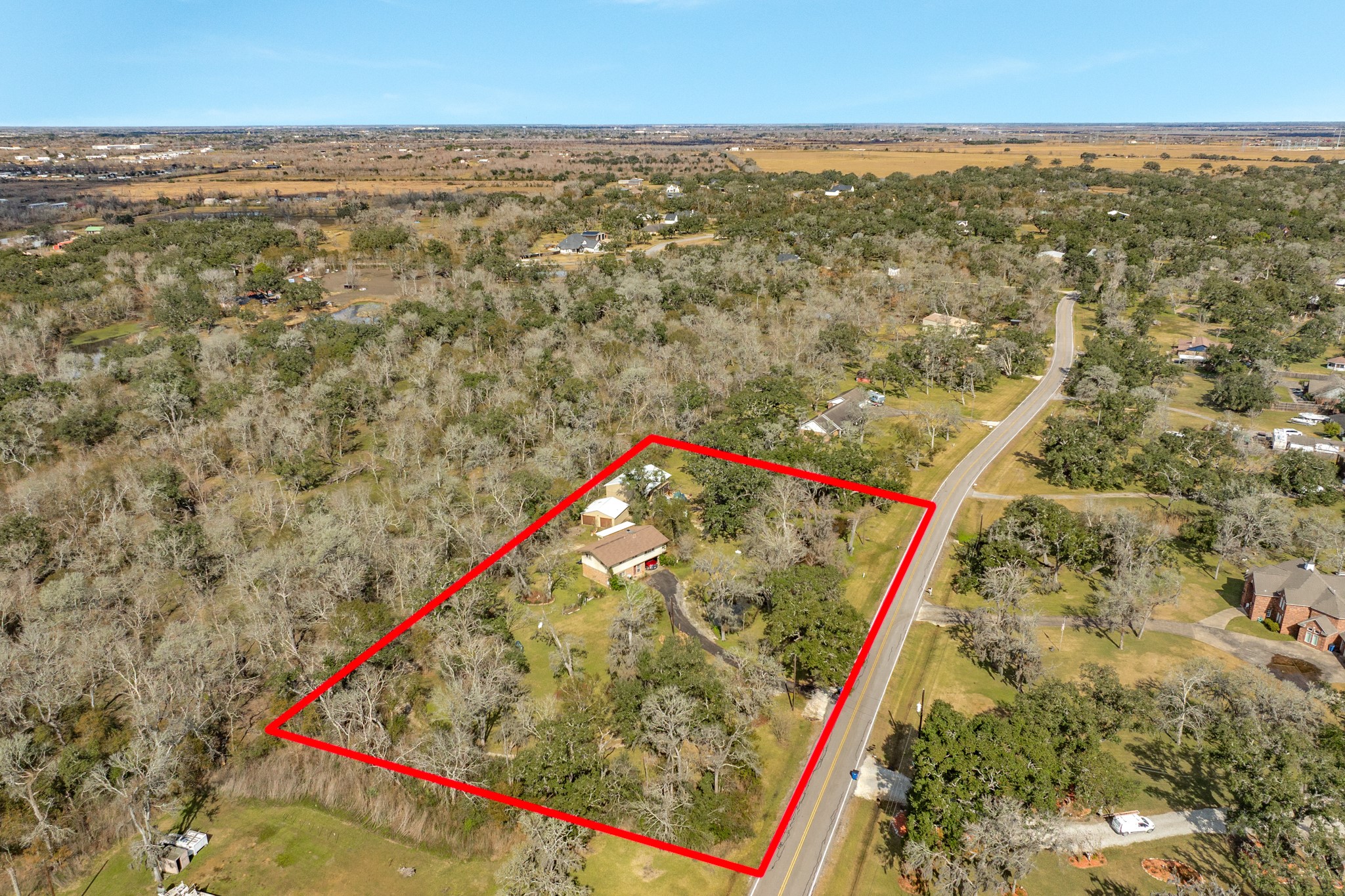 703 County Road 605 Angleton, TX 77515 - Photo 10 of 35 an aerial view of beach and residential space