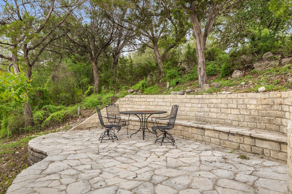 701 Hurst Creek Road Lakeway, TX 78734 - Photo 33 of 37 Private HOA stone patio seating area near the day dock