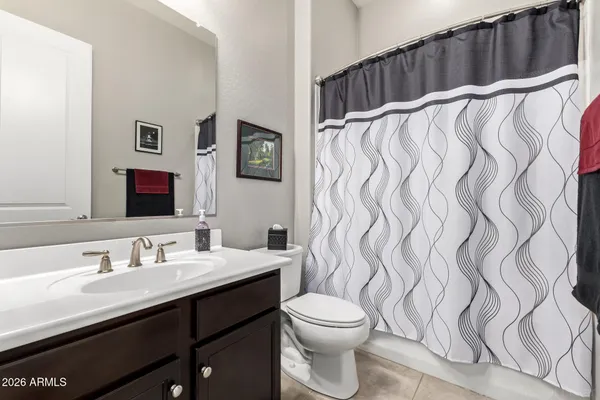 a picture of a bathroom with a sink