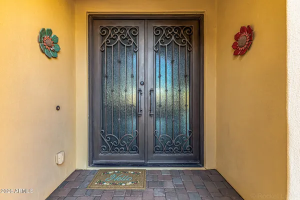 a view of front door with a glass door