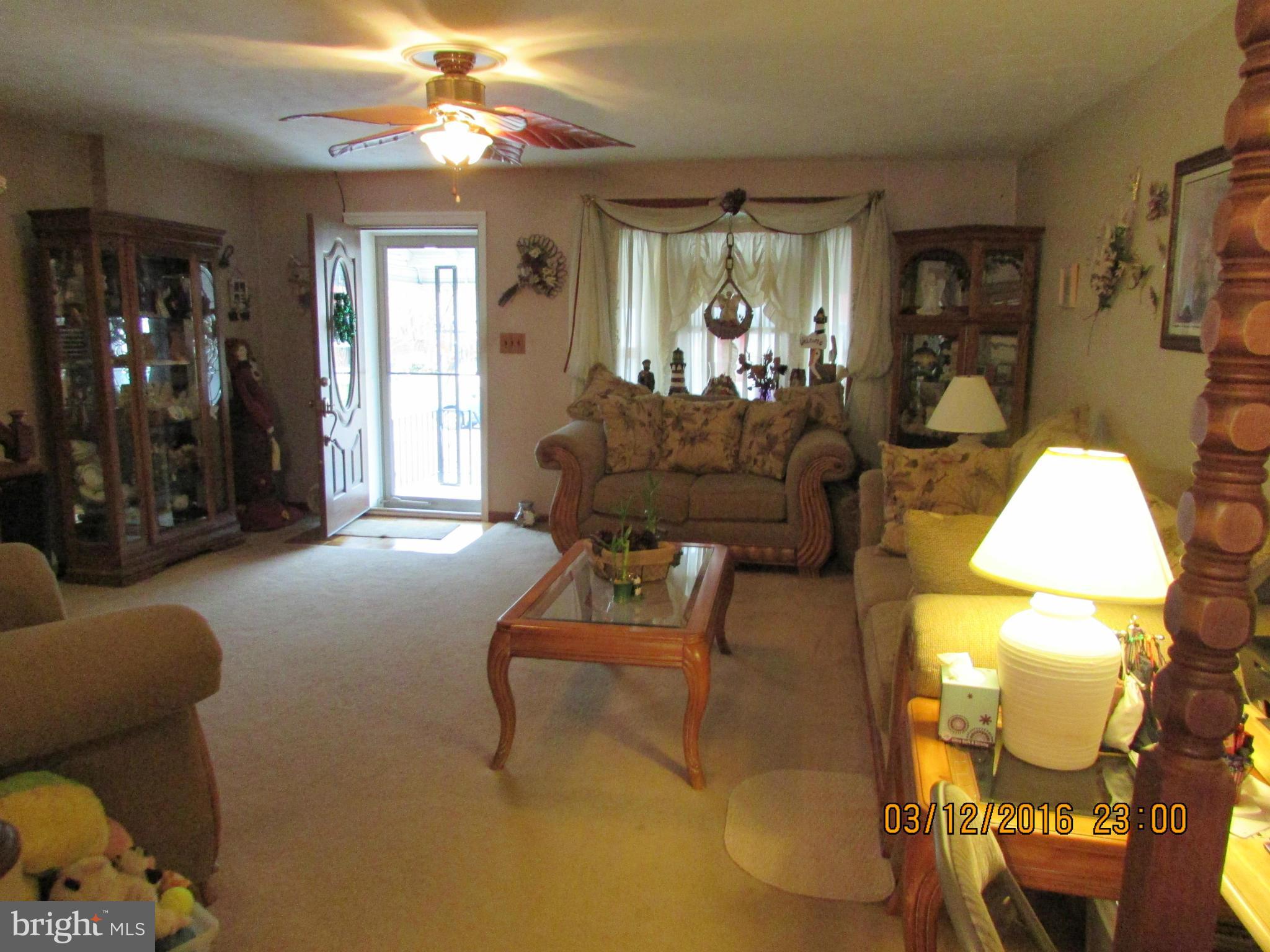 1925 Quentin Road Baltimore, MD 21222 - Photo 4 of 28 a living room with furniture and dining room