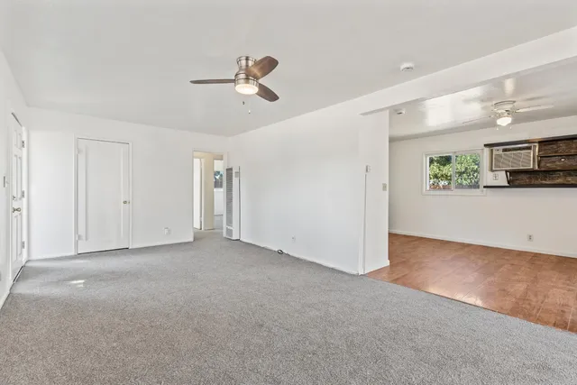 a view of a livingroom and entryway