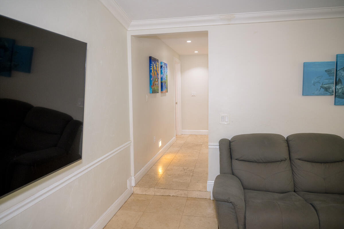 464 Lime Drive Key Largo, FL 33037 - Photo 17 of 96 a living room with furniture and a flat screen tv