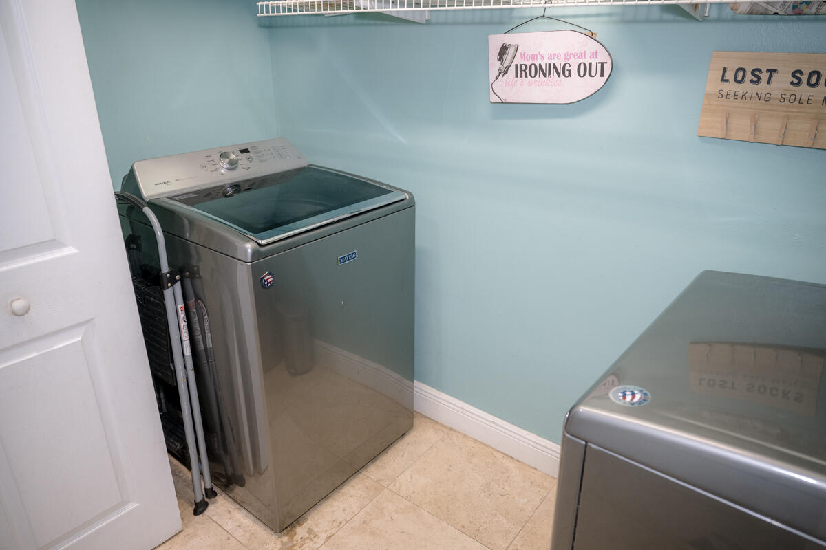 464 Lime Drive Key Largo, FL 33037 - Photo 19 of 96 a utility room with dryer and washer