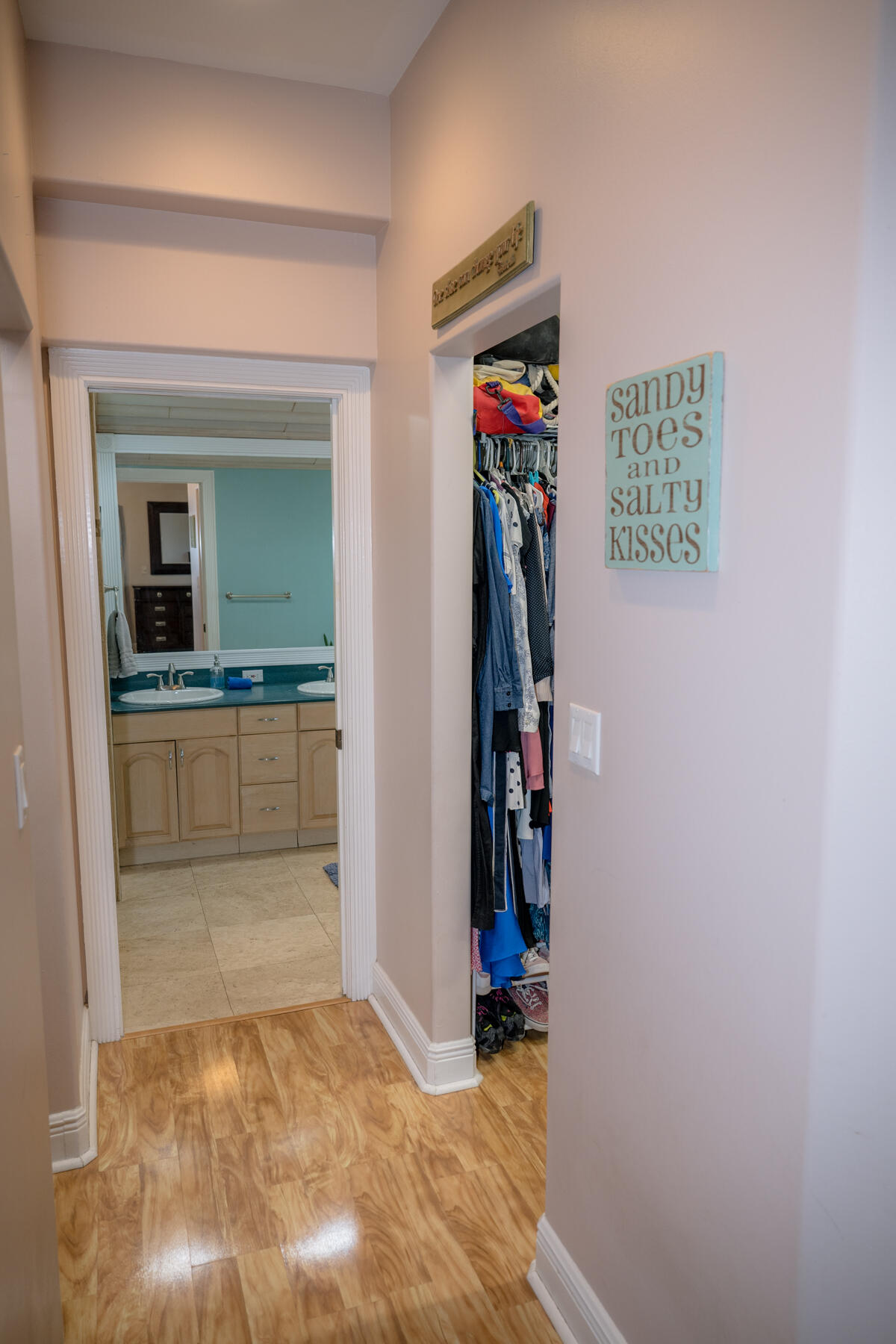 464 Lime Drive Key Largo, FL 33037 - Photo 24 of 96 a view of walk in closet with clothes and shoes