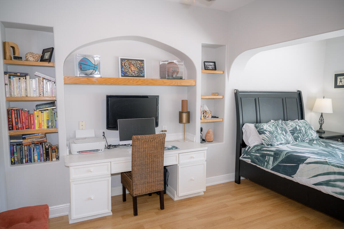 464 Lime Drive Key Largo, FL 33037 - Photo 42 of 96 a bedroom with a bed and a workspace