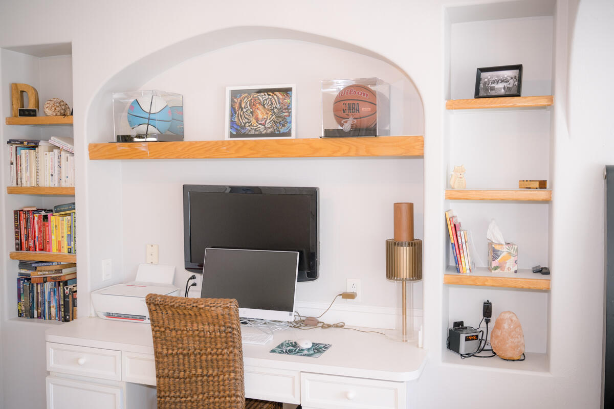 464 Lime Drive Key Largo, FL 33037 - Photo 43 of 96 a living room with furniture and a book shelf