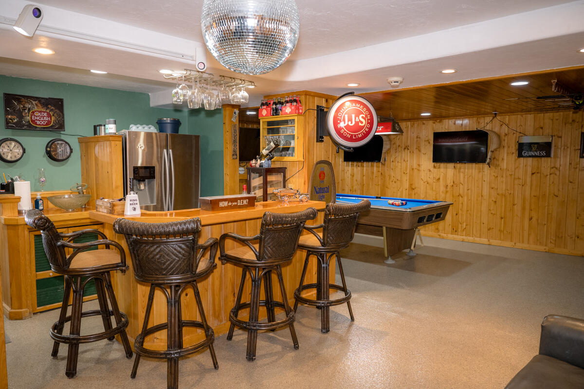 464 Lime Drive Key Largo, FL 33037 - Photo 54 of 96 a view of a dining room with furniture and chandelier