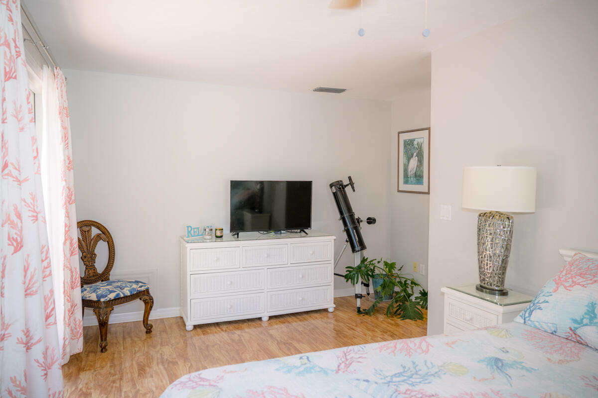 464 Lime Drive Key Largo, FL 33037 - Photo 67 of 96 a living room with furniture and a flat screen tv