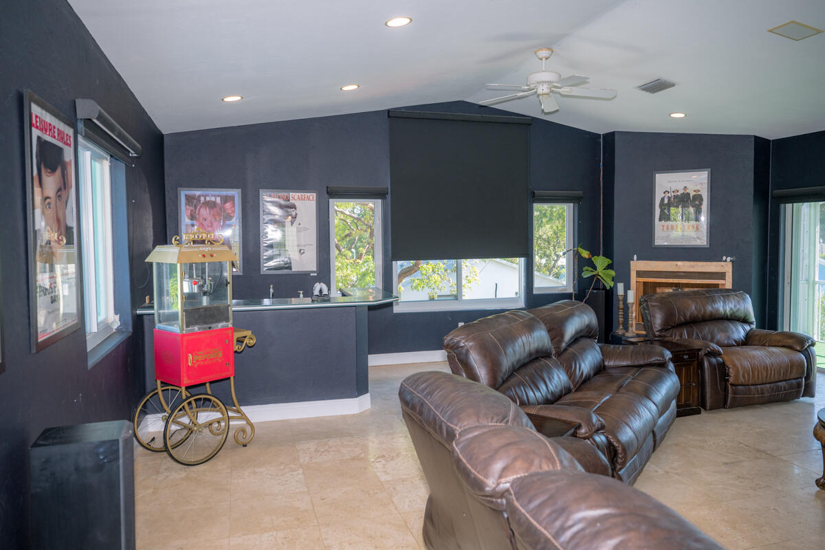 464 Lime Drive Key Largo, FL 33037 - Photo 77 of 96 a living room with furniture gym equipment and a window