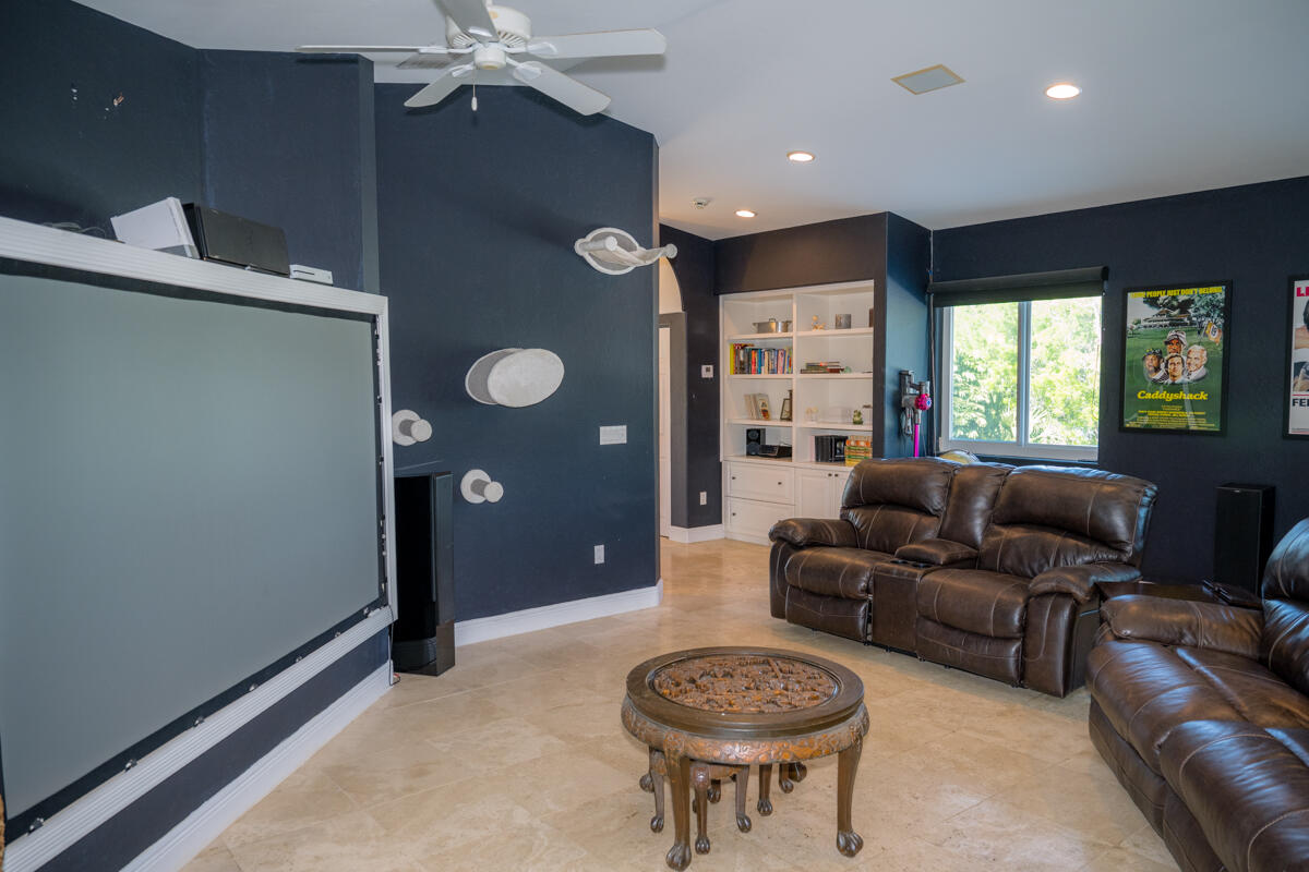 464 Lime Drive Key Largo, FL 33037 - Photo 81 of 96 a living room with furniture a window and a chandelier