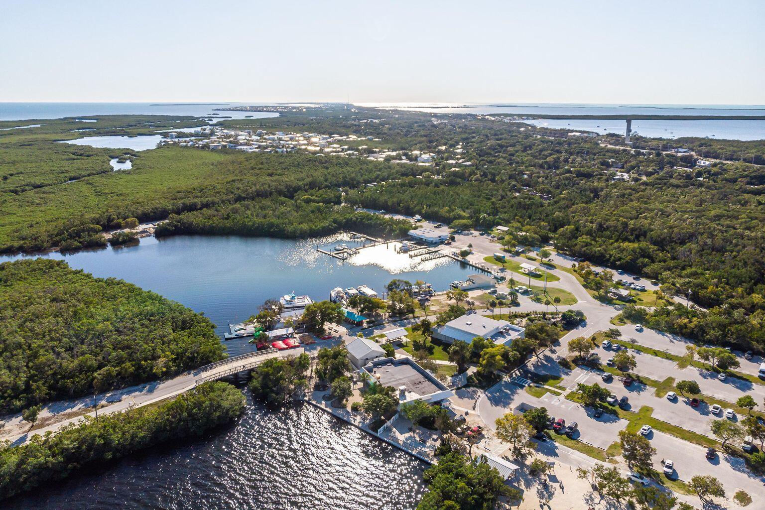 464 Lime Drive Key Largo, FL 33037 - Photo 88 of 96 an aerial view of a city with mountains