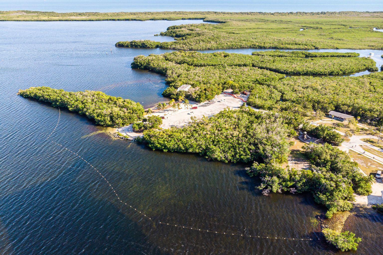 464 Lime Drive Key Largo, FL 33037 - Photo 95 of 96 a view of a lake with a mountain