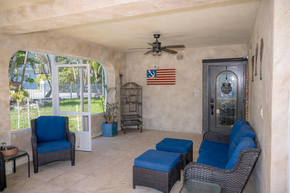 464 Lime Drive Key Largo, FL 33037 - Photo 10 of 96 a living room with furniture and a window