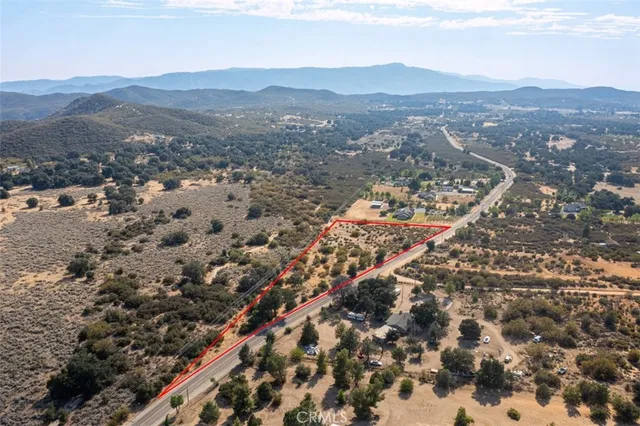 a view of a city with mountains in the background