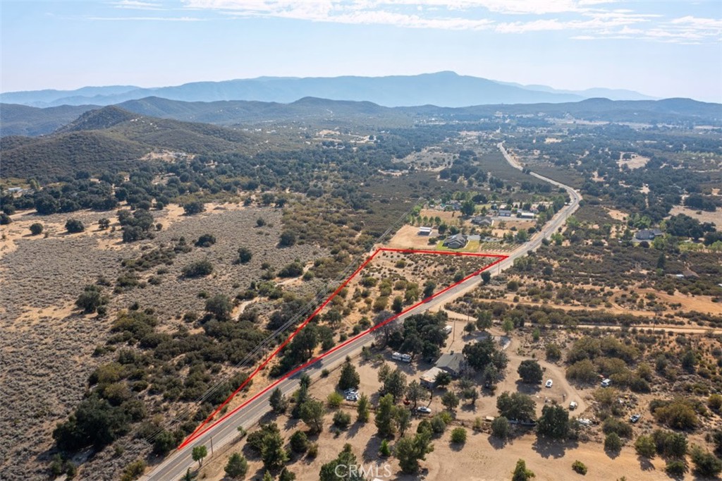 a view of a city with mountains in the background