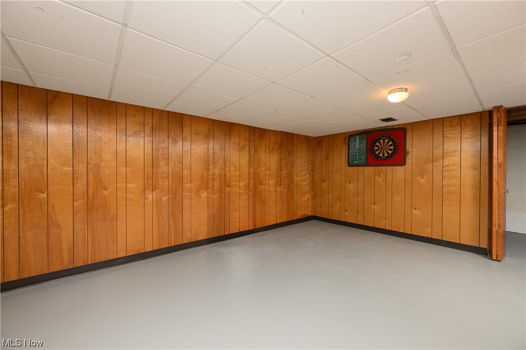 2969 Chamberlain Road Akron, OH 44333 - Photo 30 of 33 Lower level 32 x 14 rm with paneled walls and a FP