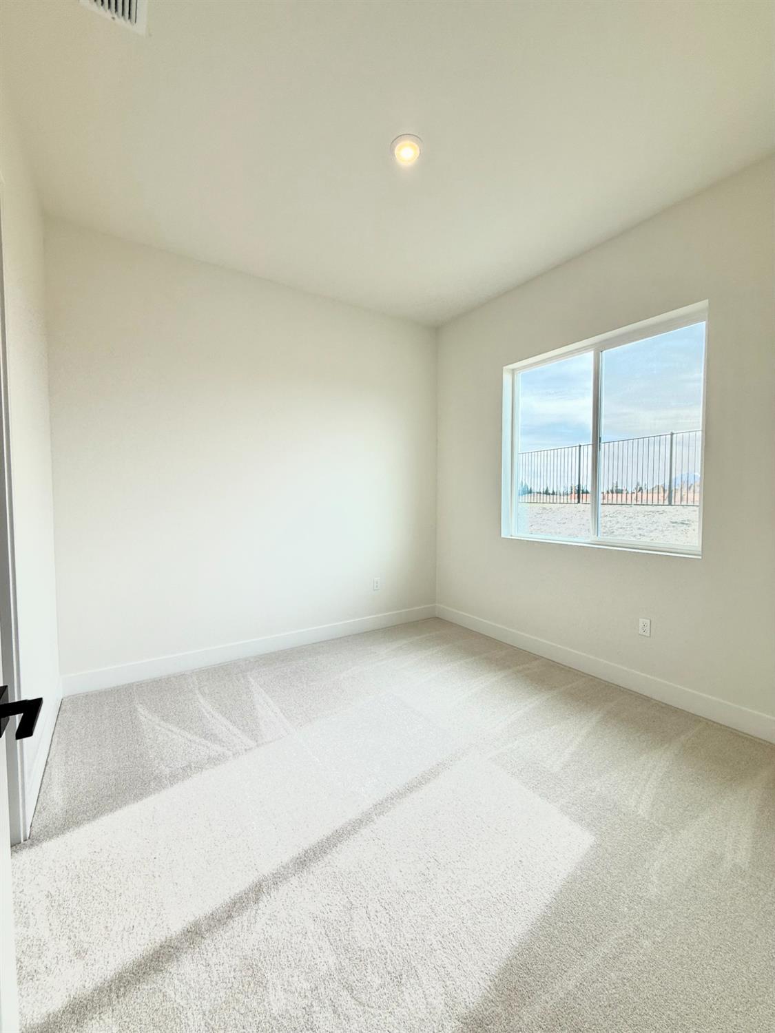 7056 Dalton Rnch Drive Rancho Murieta, CA 95683 - Photo 12 of 29 an empty room with windows