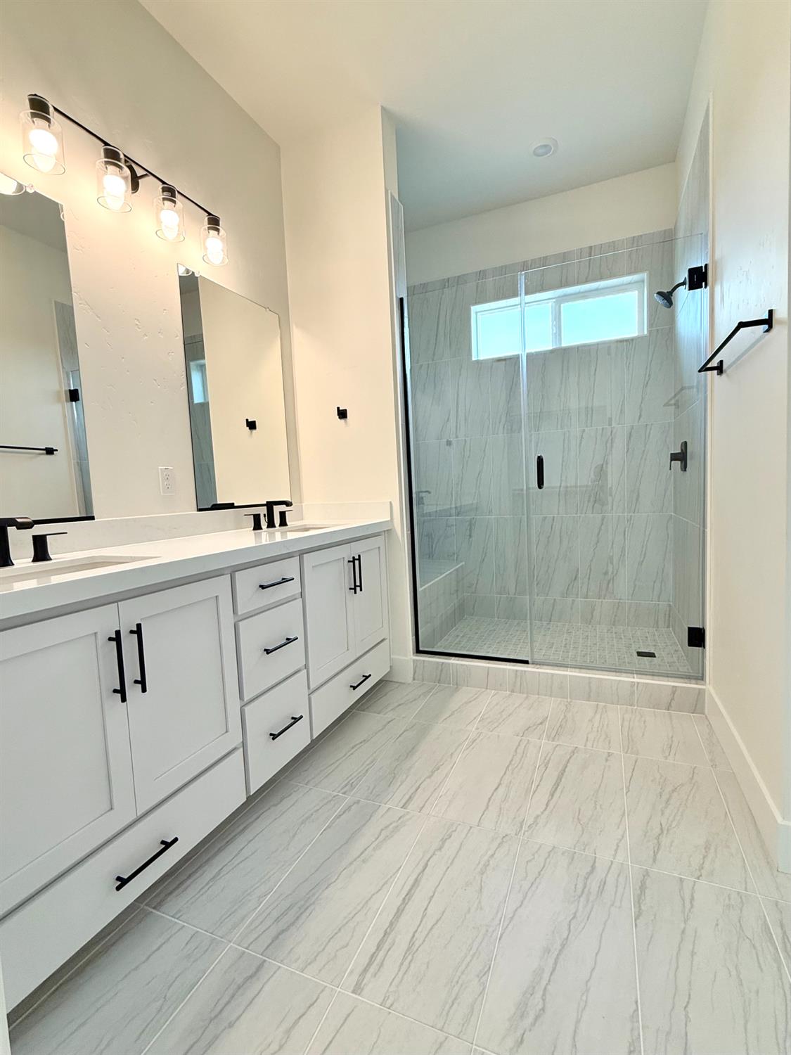 7056 Dalton Rnch Drive Rancho Murieta, CA 95683 - Photo 18 of 29 a bathroom with a double vanity sink mirror and shower